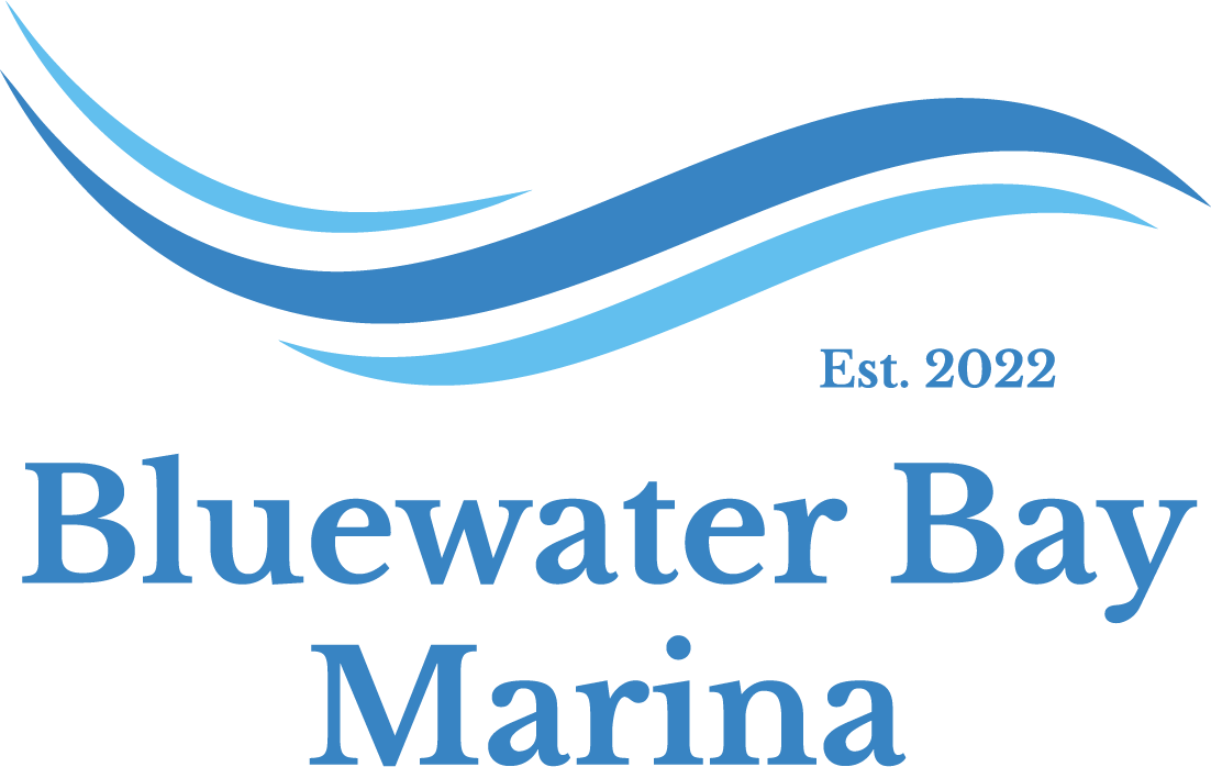 Logo for Bluewater Bay Marina featuring stylized blue waves above the text Bluewater Bay Marina, highlighting our scenic location on Lake Tenkiller. The phrase Est. 2022 elegantly graces the right of the waves, celebrating our boating and rental services heritage.